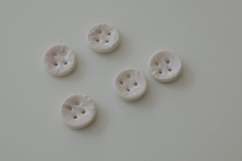 Porcelain button - erbium