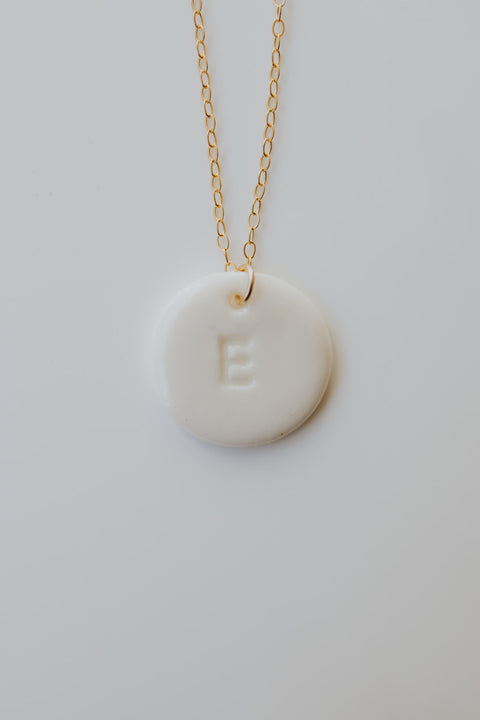 Personalizable necklace with porcelain initial pendant