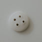 Porcelain button - erbium