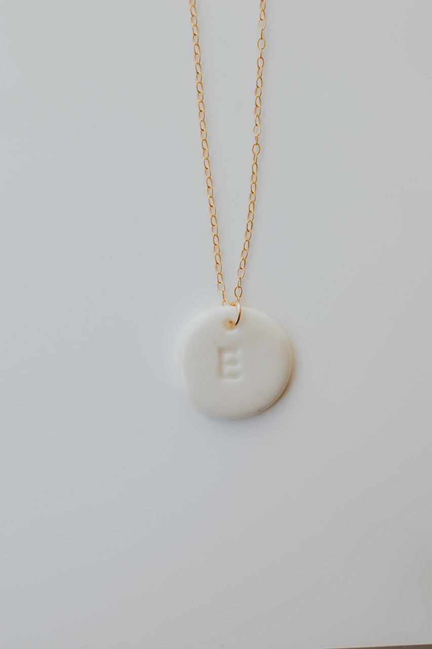 Personalizable necklace with porcelain initial pendant