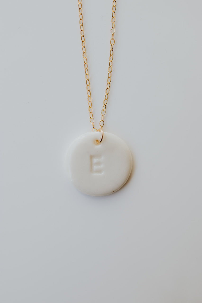Personalizable necklace with porcelain initial pendant
