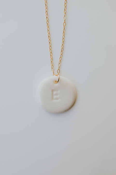 Personalizable necklace with porcelain initial pendant