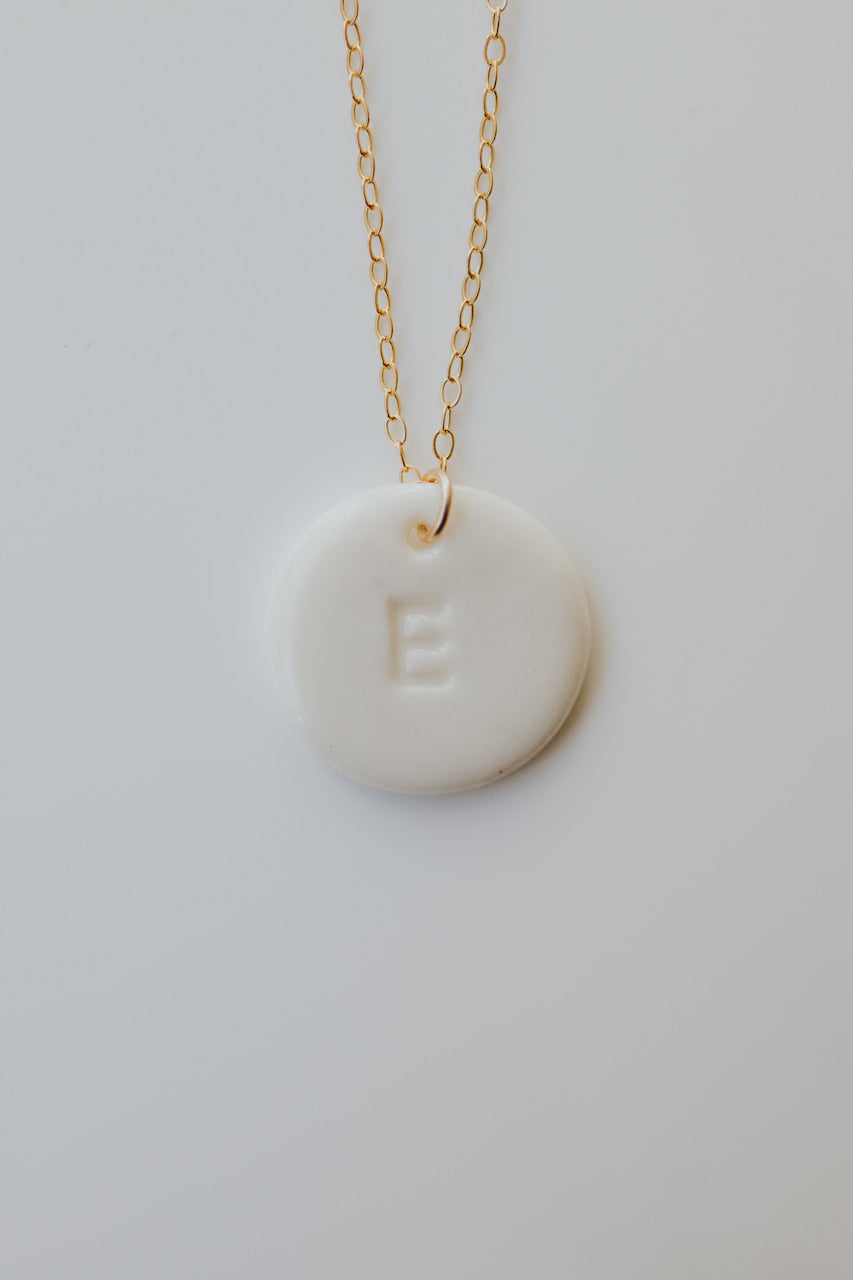 Personalizable necklace with porcelain initial pendant