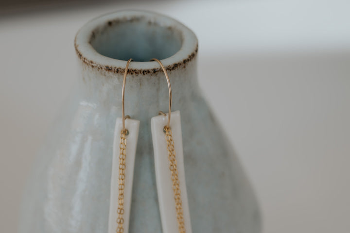 Long white porcelain earrings with gold filled wire
