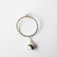 Orbit - 935 handmade silver hoop with small porcelain bell