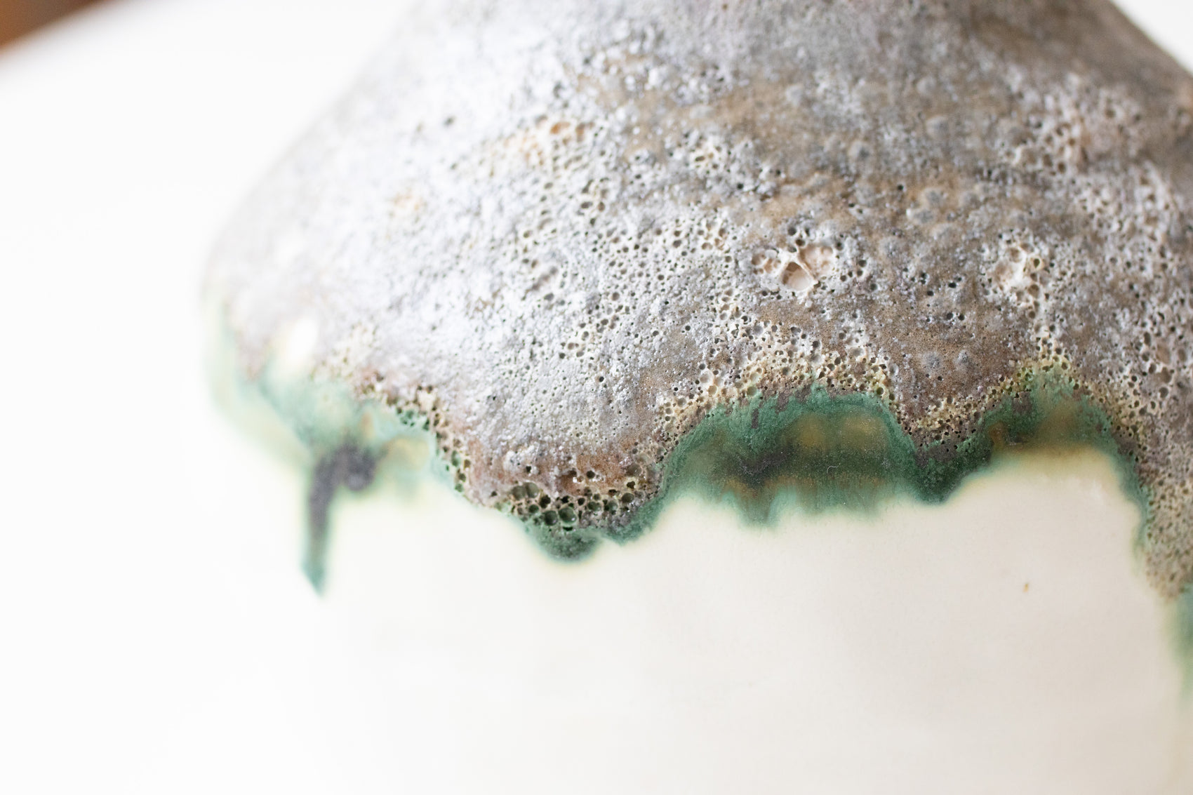 Porcelain vase with lava glazes