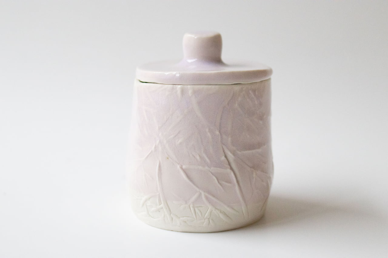 Porta tesori: lidded erbium jar