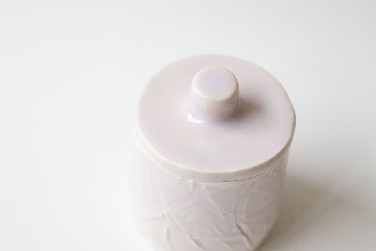 Porta tesori: lidded erbium jar