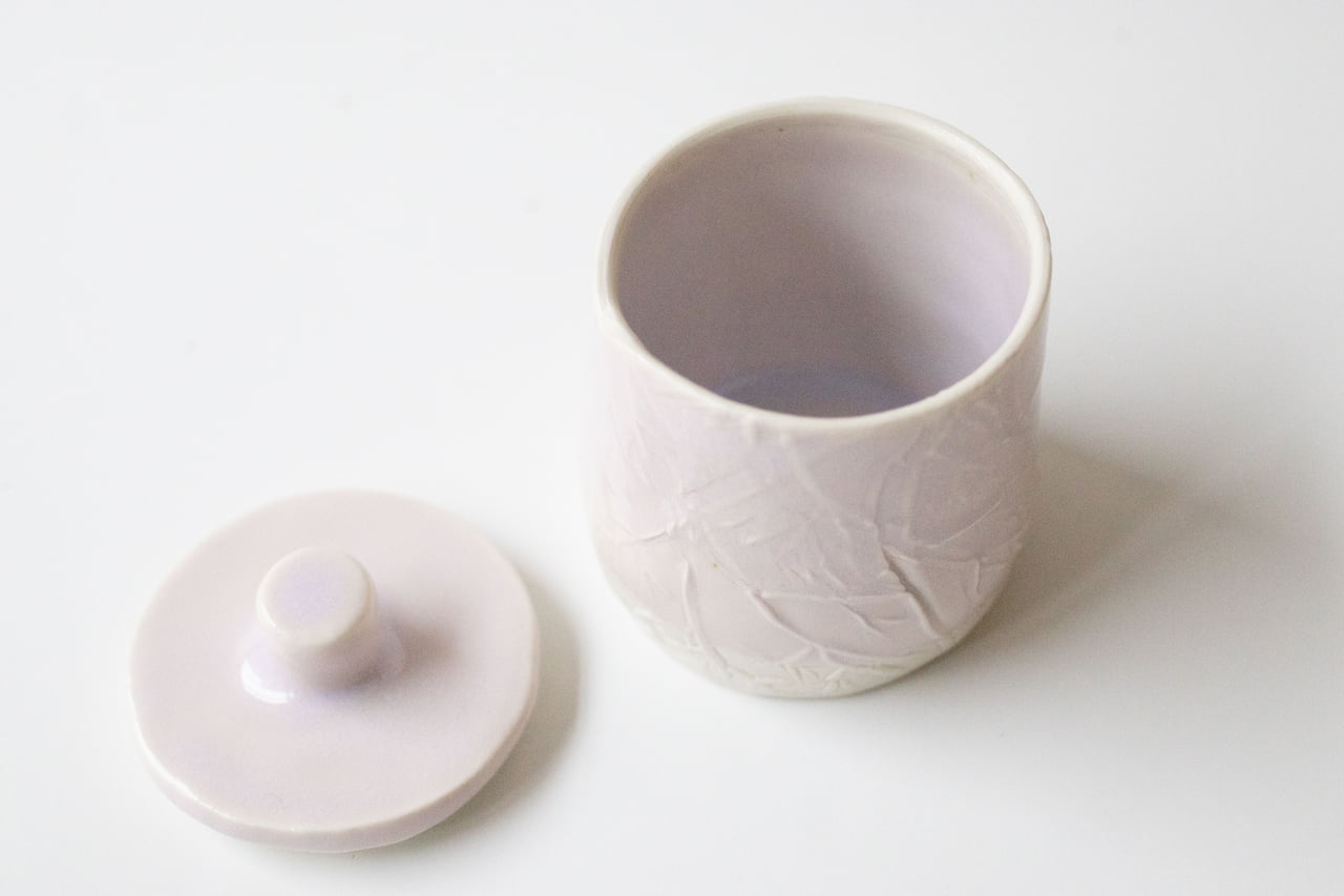 Porta tesori: lidded erbium jar