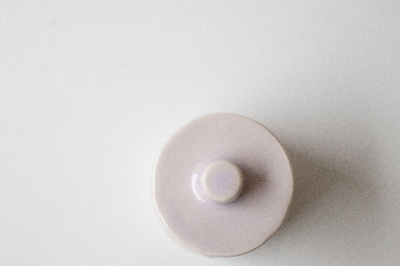 Porta tesori: lidded erbium jar